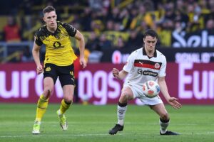 Dortmund feiert knappen 3:2-Sieg gegen St. Pauli im spannenden Bundesliga-Spiel.