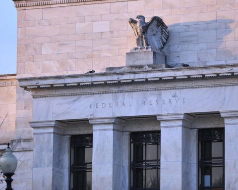 Symbolische Darstellung der Federal Reserve, Zinsentscheidungen und wirtschaftliche Entwicklungen in den USA.