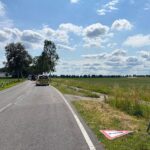 Motorradunfall auf Landesstraße 127 mit schwer verletztem Fahrer und Rettungshubschrauber.