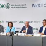 Diagramm mit steigenden Heilmittel-Ausgaben und Arzt-Patienten-Interaktion im Gesundheitswesen.